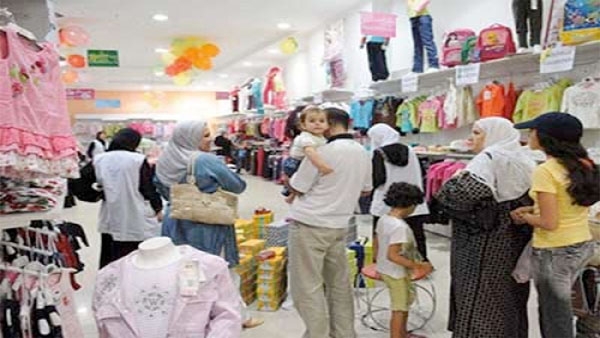 شعبة الملابس: تصادف الأوكازيون مع العيد أنعش المبيعات بـ 20%