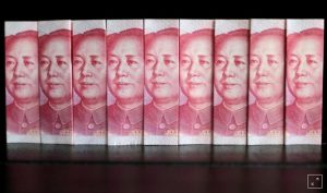 بنك الصين الشعبي يثبت سعر الدولار مقابل اليوان عند 7.1280