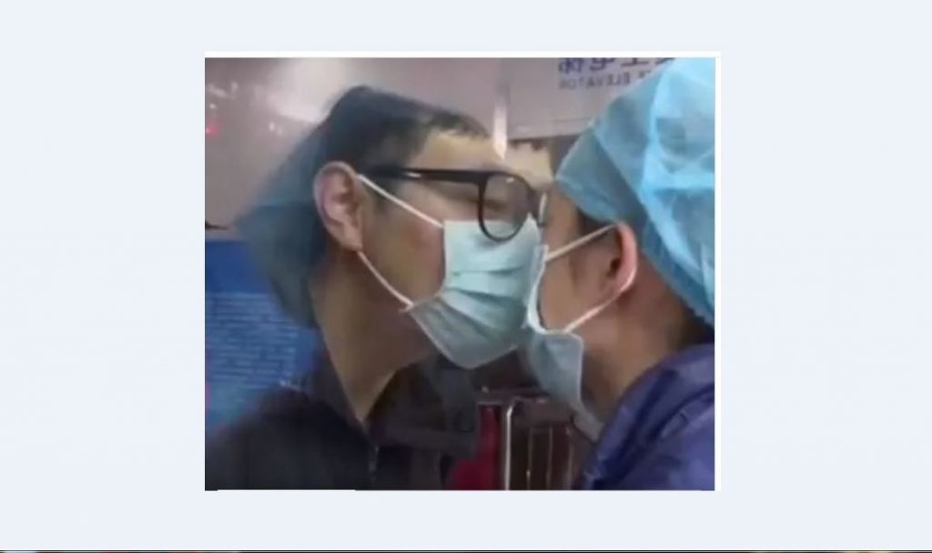 الصين : عناق وقبلة في أجنحة العزل .. فيروس كورونا يفرق بين المحبين (فيديو)