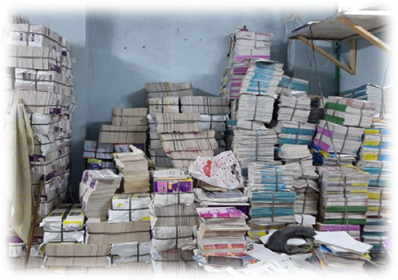 مصادرة 185 ألف كتاب تعليمي بمخزن غير مرخص بالقاهرة (صور)