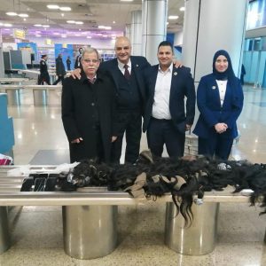 ضبط تهريب كميات من الشعر الطبيعي المستعار بمطار القاهرة