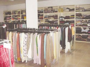 تجار بالإسكندرية يقيمون أداء مبيعات الملابس الجاهزة خلال موسم الأوكازيون الشتوي الحالي