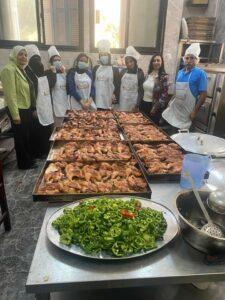 القومي للمرأة والكنيسة الإنجيلية في بورسعيد تنفذان مبادرة إطعام 260 وجبة إفطار صائم